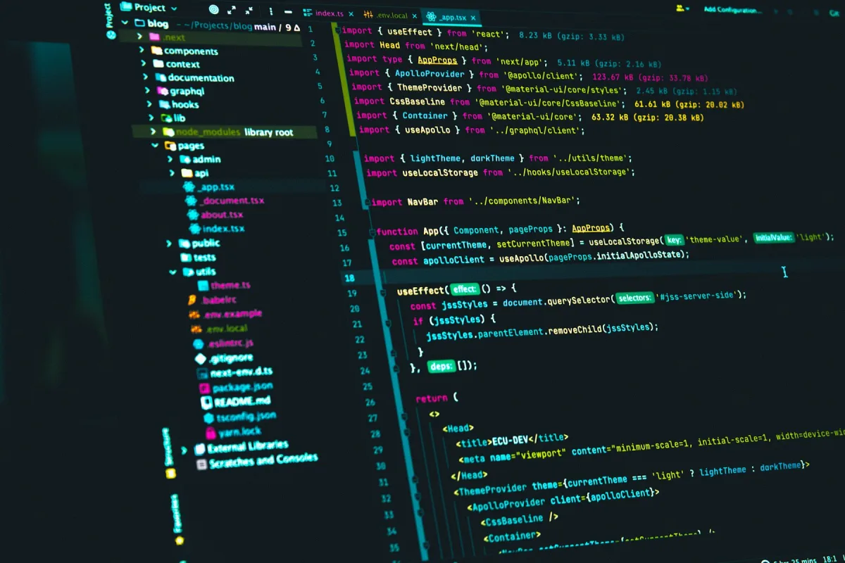 A code editor open on a dark screen, showing a project file tree beside a component source file